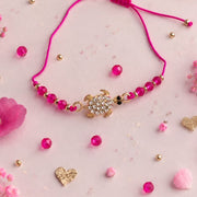Bracelet Tortue fuchsia – cadrage harmonisé
